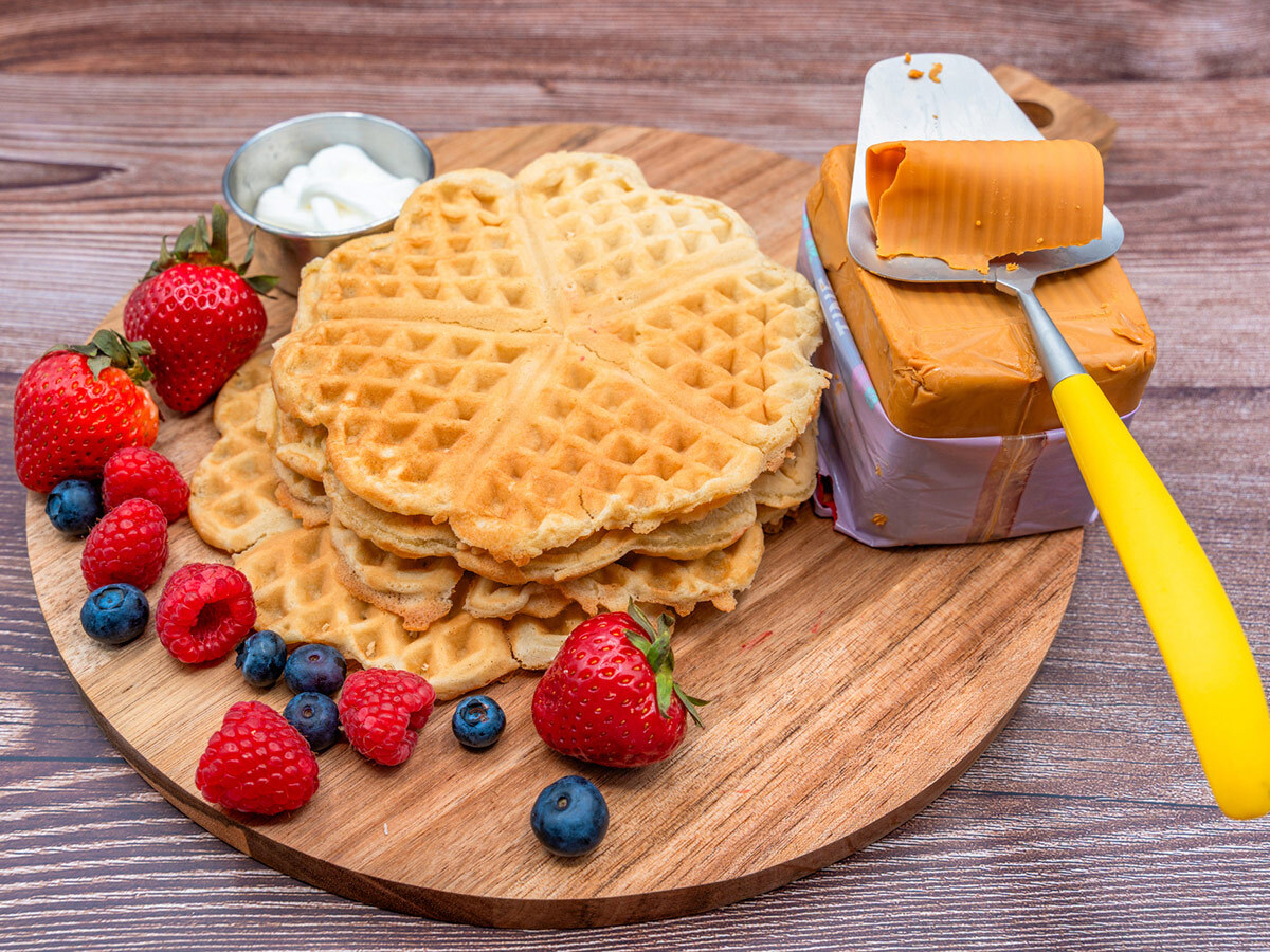 Norwegian heart-shaped waffles with sour cream and jam